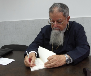 Archbishop Chacour signing Rosemary's copy of 'Faith Beyond Despair'Photo: Rosemary